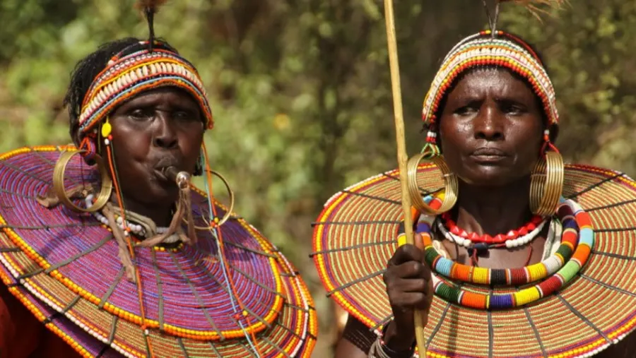 Maasai women with intricate colorful beaded jewelry and necklaces