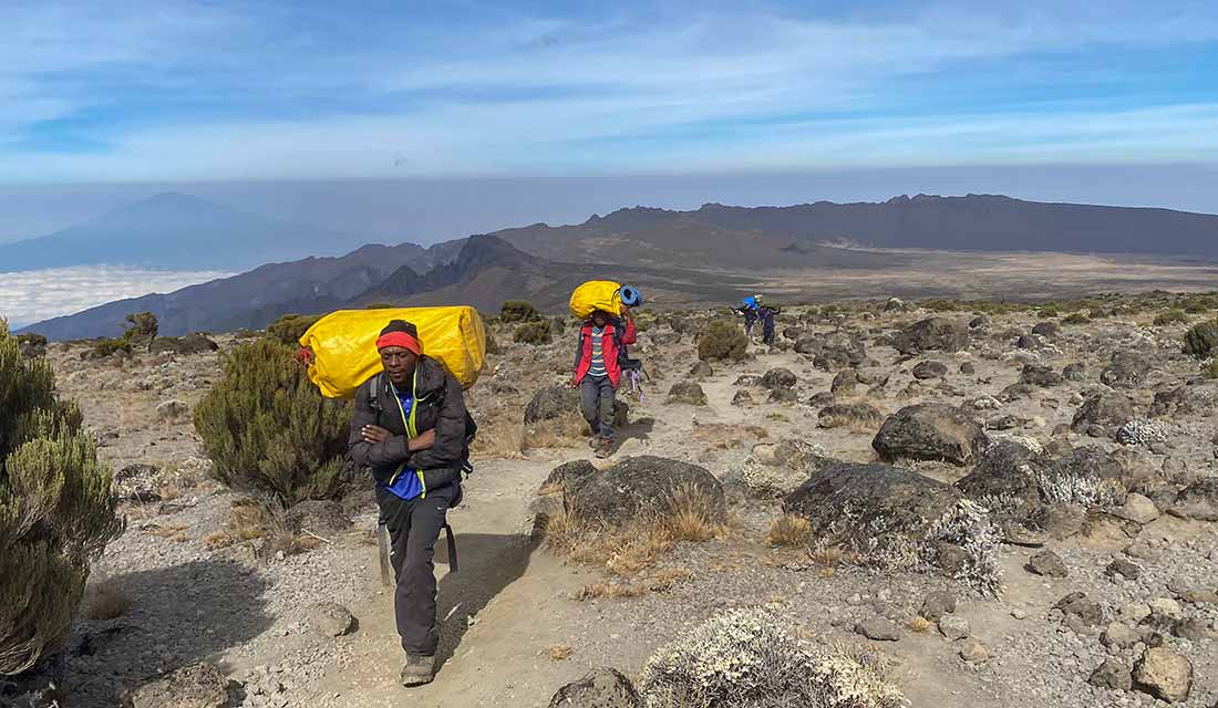 Kilimanjaro Climbers and Porters on Trail